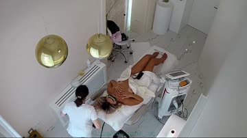 Hidden cam caught all of her hair removal treatment 12