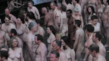 Naked street art performance