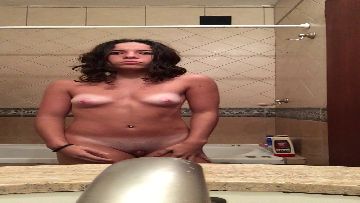 Voluptuous naked girl caught in shower